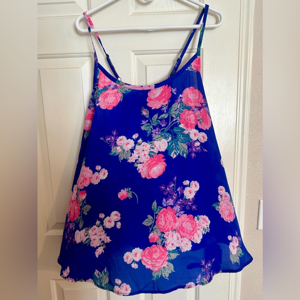 Torid size 2 camisol. Vibrant blue floral with laced tie-up feature on back.